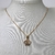 COLAR CRAVEJADO BORBOLETA CRISTAL 18K
