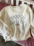 Imagen de BUZO NY CREMA