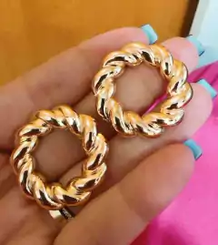 BRINCO ARO VAZADO TORCIDO GG - comprar online