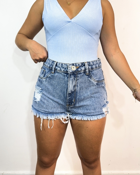 Short jeans marmorizado barra desfiada
