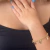 PULSEIRA 3 CORRENTES COM PINGENTE FE FOLHEADA EM OURO 18K - comprar online