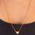 COLAR ESCAPULARIO LOVE FOLHEADO EM OURO 18K na internet