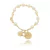 PULSEIRA DE PEROLAS COM PINGENTES FOLHEADO EM OURO 18K