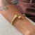 BRACELETE ORGANICO FINO DOURADO