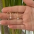 CONJUNTO COLAR E BRINCO CORACAO VAZADO COM UMA ZIRCONIA EM OURO 18K na internet