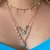 CONJUNTO COLAR TRIPLO COM PEDRAS FUSION COLORIDAS FOLHEADA EM OURO 18K na internet