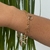 PULSEIRA DUPLA COM DENTE DE ELEFANTE FOLHEADO EM OURO 18K
