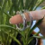 ARGOLA TUBO OVAL FOLHEADA EM RODIO