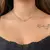 COLAR CHOKER BÚZIO FOLHEADO EM OURO 18K - comprar online