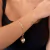 PULSEIRA DE ELOS COM PINGENTE CORAÇÃO COM PÉROLA FOLHEADO EM OURO 18K