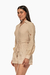 Romper de mangas caladas color beige, con un diseño elegante y ceñido a la cintura. Mod. Katerin sku. 34929