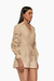Romper de mangas caladas color beige, con un diseño elegante y ceñido a la cintura. Mod. Katerin sku. 34929