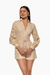 Romper de mangas caladas color beige, con un diseño elegante y ceñido a la cintura. Mod. Katerin sku. 34929
