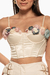 Top bralette blanco con delicadas flores decorativas en el escote. Mod. Xana Sku. 34020