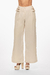 Pantalón de color beige con hebillas en la cintura, estilo ancho y elegante. Mod. Mariam Sku. 34347