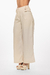Pantalón de color beige con hebillas en la cintura, estilo ancho y elegante. Mod. Mariam Sku. 34347