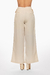 Pantalón de color beige con hebillas en la cintura, estilo ancho y elegante. Mod. Mariam Sku. 34347