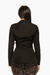 Conjunto de pantalón con perlas y un blazer negro, destacando su diseño elegante y moderno. Mod. Raizel Sku. 33886