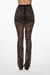 Conjunto de pantalón con perlas y un blazer negro, destacando su diseño elegante y moderno. Mod. Raizel Sku. 33886