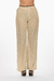Pantalón de lino en color beige con detalles a contraste y ajuste en la cintura.Mod. Esmeralda sku. 34881