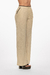 Pantalón de lino en color beige con detalles a contraste y ajuste en la cintura.Mod. Esmeralda sku. 34881