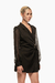 Romper negro con cinturón de hebilla abstracta, con diseño de mangas transparentes y corte elegante. Mod. Sira Sku. 33955