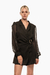 Romper negro con cinturón de hebilla abstracta, con diseño de mangas transparentes y corte elegante. Mod. Sira Sku. 33955