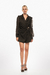Romper negro con cinturón de hebilla abstracta, con diseño de mangas transparentes y corte elegante. Mod. Sira Sku. 33955