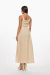 Vestido midi corset de textura en color beige, con tirantes anchos y falda amplia. Mod. Olivia Sku. 34785