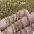 Strass em metro dourado