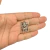 Pingente tridente Exu com caveira, medindo 28x19mm para fazer guias