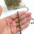 Corrente de strass ss28 com pedras pretas em base dourada
