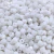 Pérolas quadradas leitosas de 8x8mm em embalagem de 100g, ideal para trabalhos manuais e artesanato.
