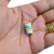 Aplique emborrachado em formato de marshmallow com cores pastel
