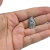 Pingente medalha oval de Santa Terezinha em metal