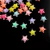 Conjunto de pedrarias coloridas em formato de estrela, com diversas cores como rosa, amarelo e verde