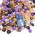 Mix de miçangas coloridas em tons de roxo, rosa e dourado, ideal para artesanato.