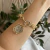 PULSEIRA MEDALHA BICOLOR CORRENTES - loja online