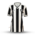 Camisa feminina do Botafogo, modelo I 24/25, nas cores preto e off white, com listras verticais e escudo do time.