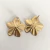 aros flor dorada - comprar online