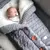 Saco ninho de dormir para bebês de tricot forrado - comprar online