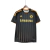 Camisa retrô preta do Chelsea, temporada 2010/2011, com detalhes em laranja e logo da Samsung
