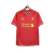 Camisa retrô vermelha do Liverpool da temporada 2013/2014, com detalhes em amarelo e logo do clube.
