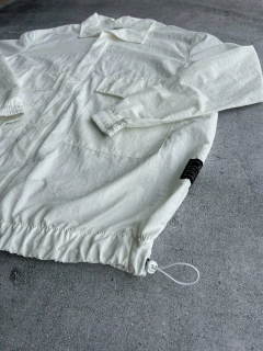 Campera rompeviento Premium raices en internet