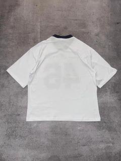 Remera boxy brt cuello azul 46 en internet