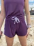 Shorts duplo Flow açaí e lilás