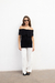 Sweater tejido sin hombros y con abertura lateral