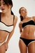 Bikini natural con vivos en negro y bombacha vedettina