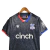 Camisa Crystal Palace III 23/24 - Torcedor Macron Masculina - Preta com detalhes em vermelho e azul - Olé FutStore | CAMISAS DE FUTEBOL