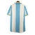Camisa da SS Lazio 1999, modelo da Liga dos Campeões, na cor azul com listras verticais brancas.